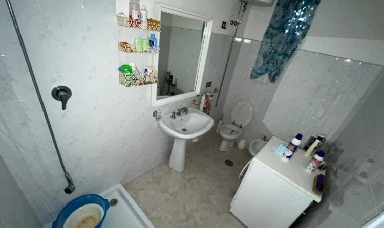 12973